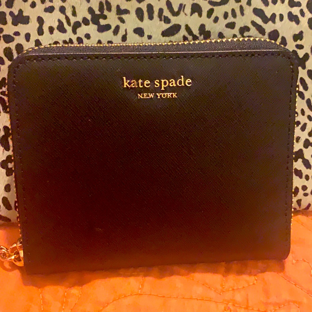 Kate Spade small zip around continental wallet.
